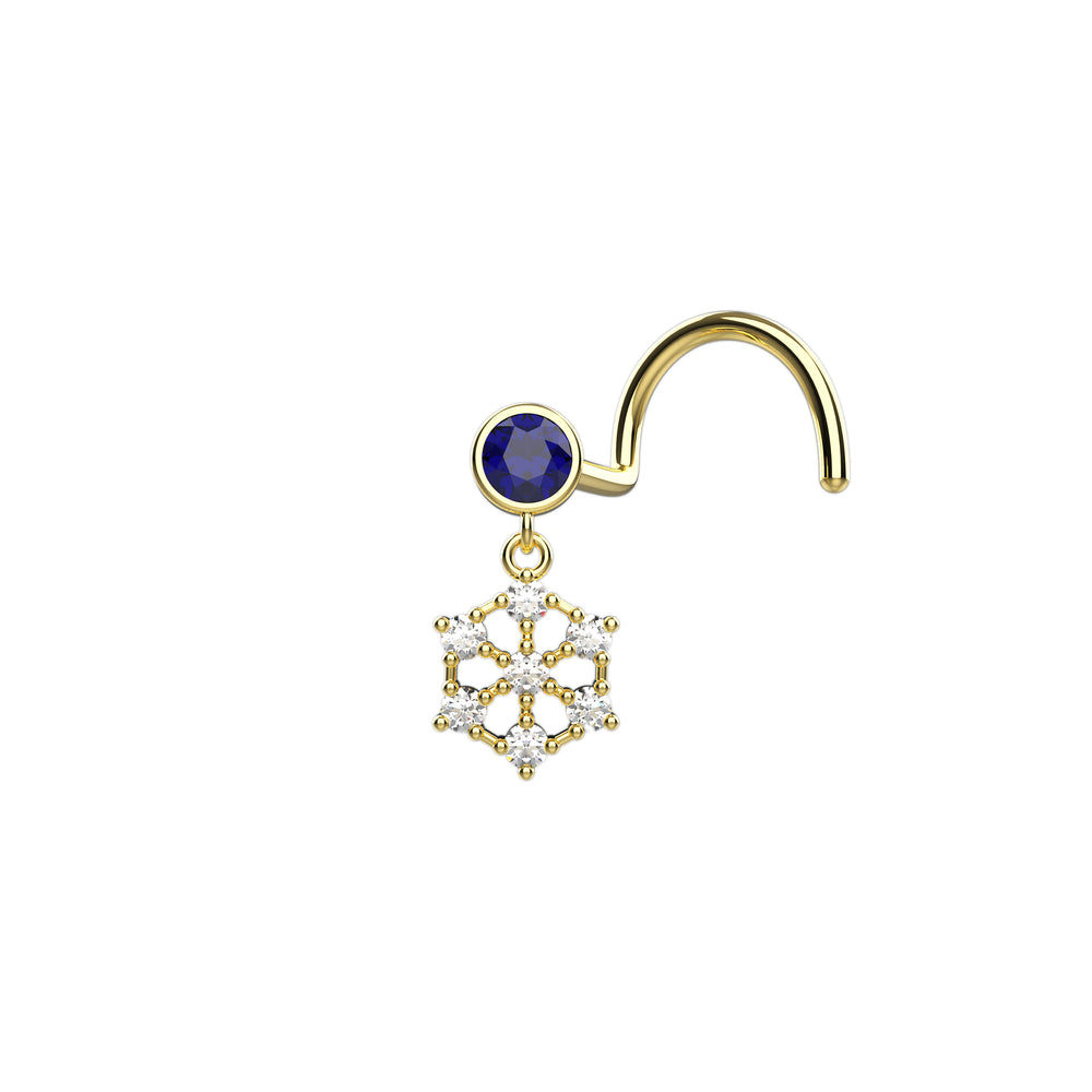Gold snowflake nose piercing