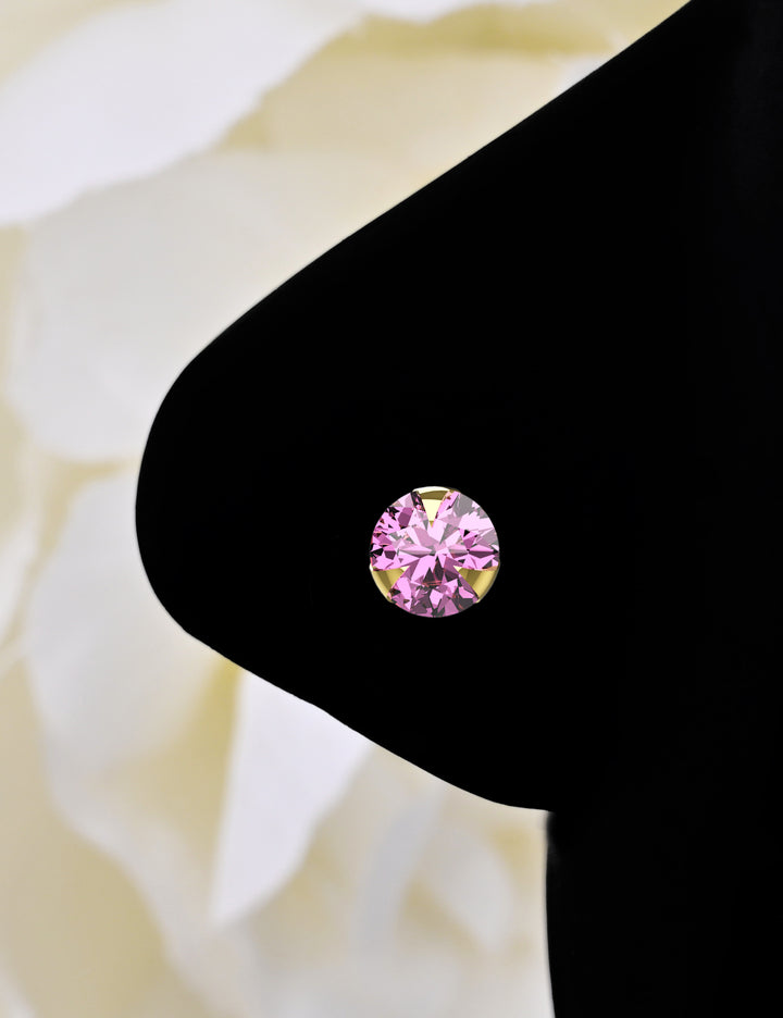 Tiny gold nose stud