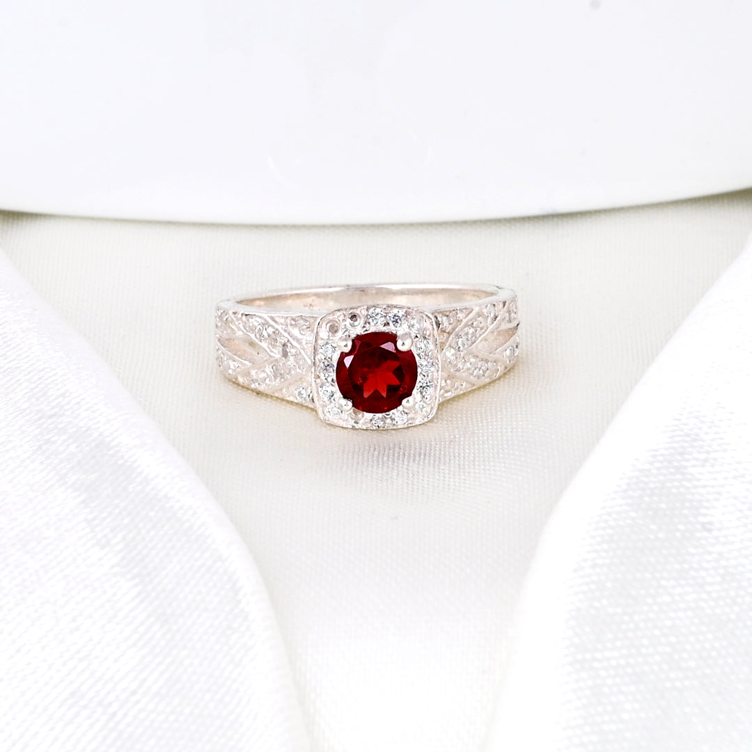 SILVER GARNET BIRTHSTONE AND DIAMOND ENGAGEMENT RING