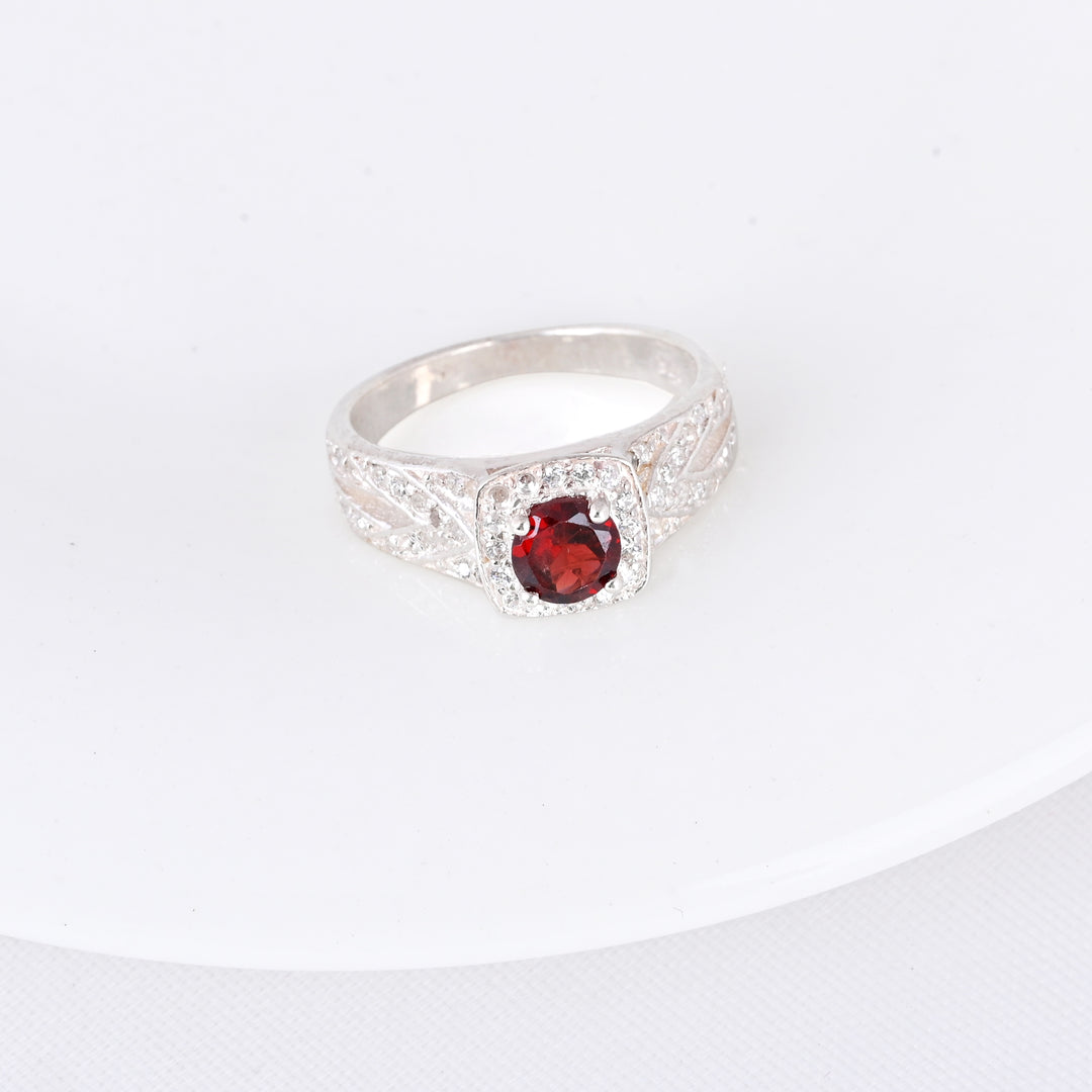 SILVER GARNET BIRTHSTONE AND DIAMOND ENGAGEMENT RING