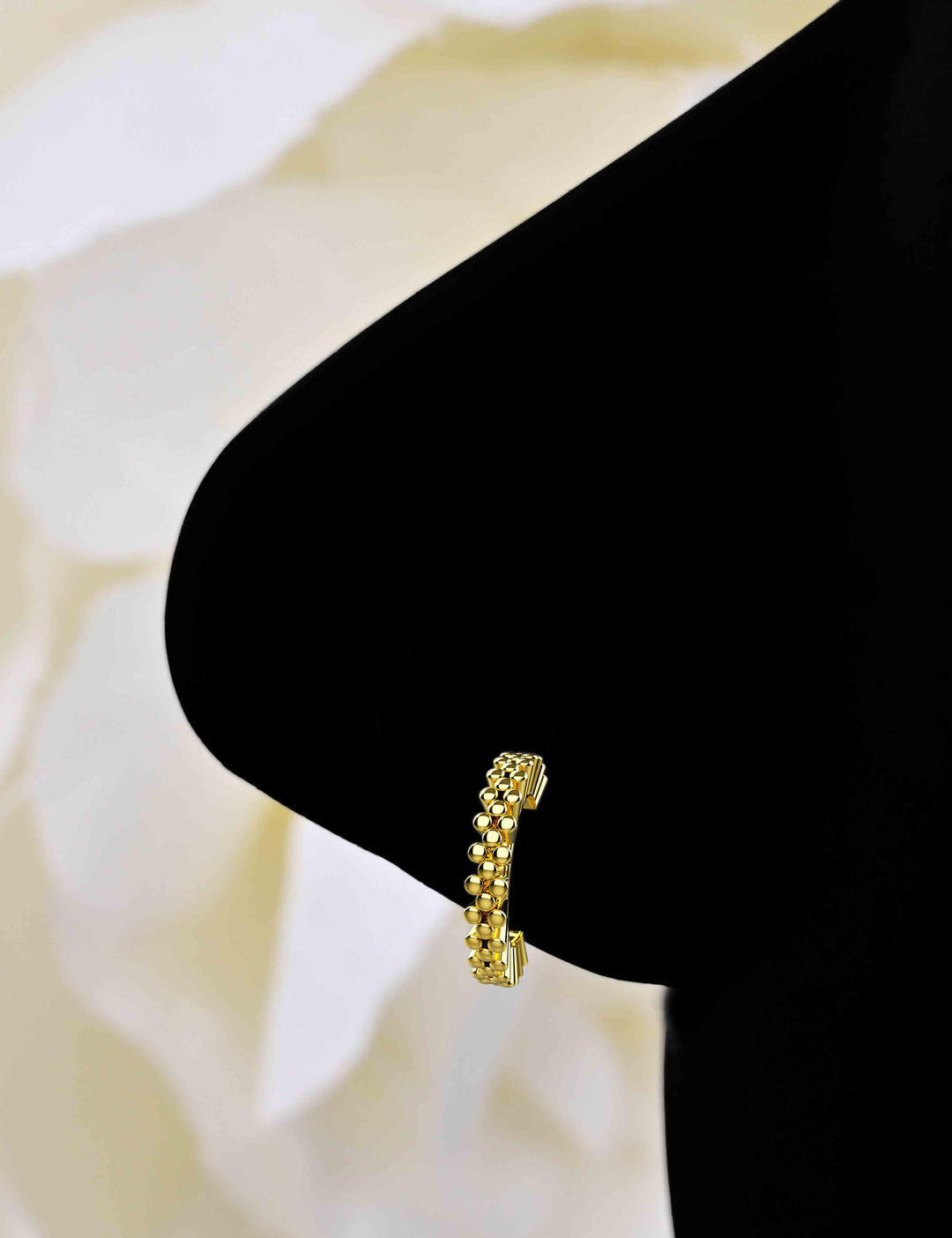 Thin gold nose hoop