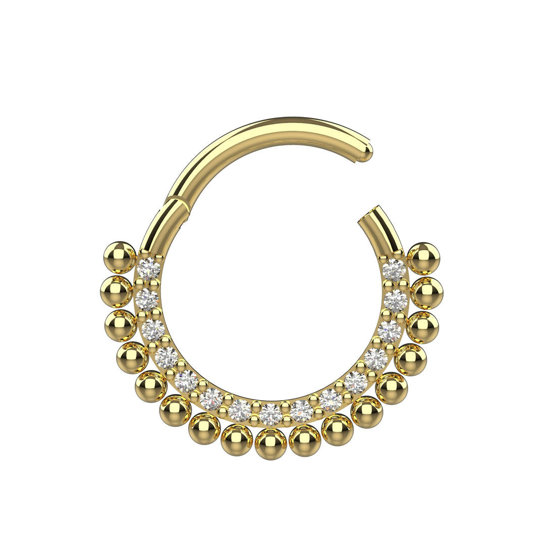silver gold septum clicker nose ring close up detail