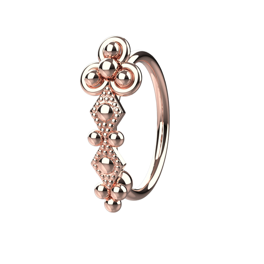 Minimalist gold nose piercing