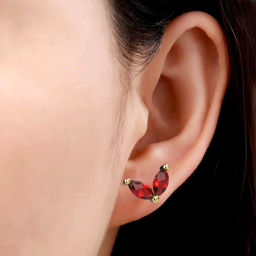 Gold earrings with natural garnet stones