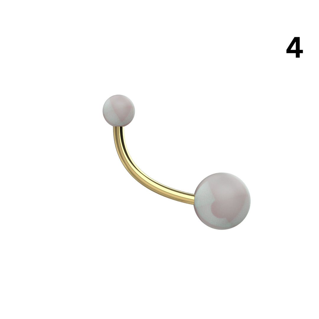 Curved banana bar ball belly ring side angle view