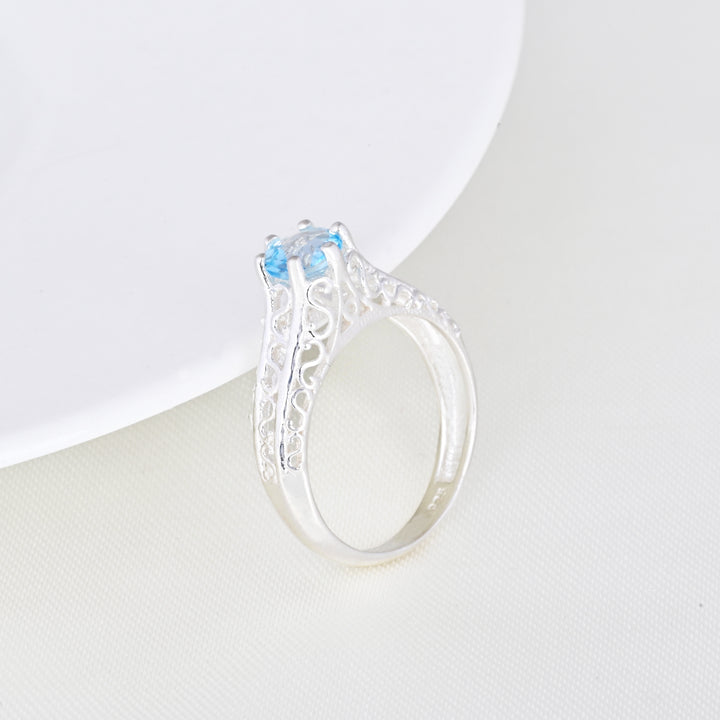 Round - Cut Halo Blue Topaz Birthstone Ring