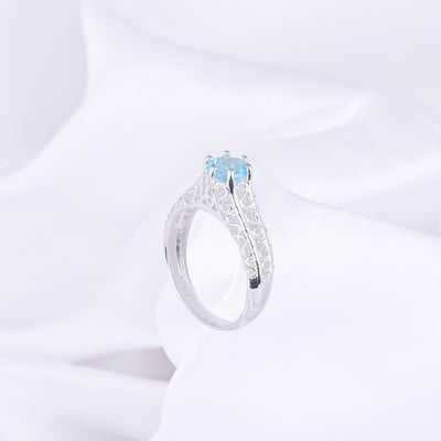 Round - Cut Halo Blue Topaz Birthstone Ring