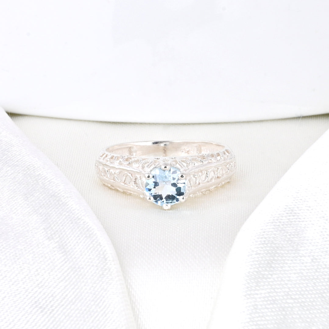 Round - Cut Halo Blue Topaz Birthstone Ring