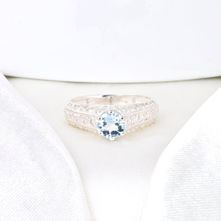 Round - Cut Halo Blue Topaz Birthstone Ring