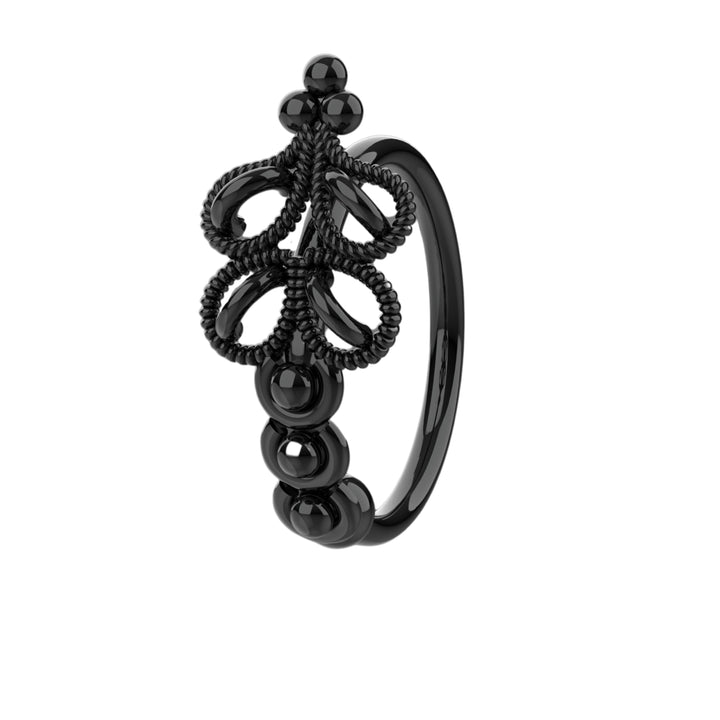 Dainty gold nose piercing